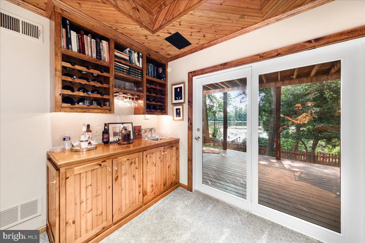 1104 Granbys Run Salisbury, MD 21804 - Photo 65 of 87 WET BAR! walk out slider to covered patio and deck