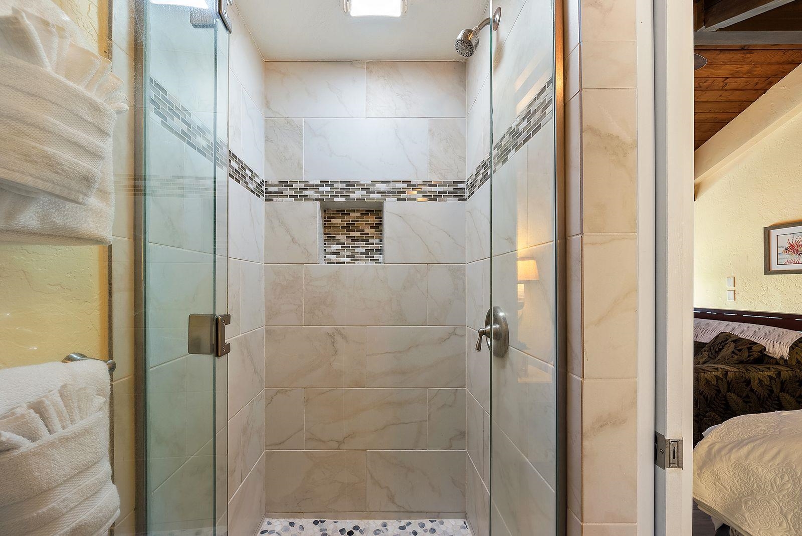 3543 Lower Honoapiilani Road, Unit J401 Lahaina, HI 96761 - Photo 16 of 25 a bathroom with a shower