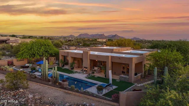 a spacious bathroom with a granite countertop sink a mirror and a shower