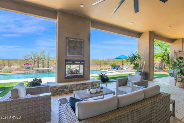 a view of a big room with a mountain in the background