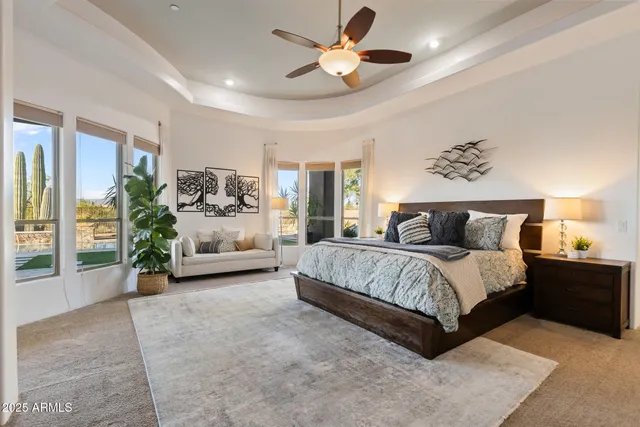 a view of a patio with a table and chairs