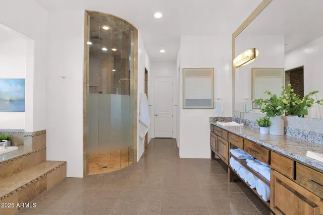 a outdoor living space with furniture and a fireplace