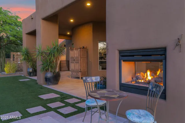 an aerial view of a house with a ocean view