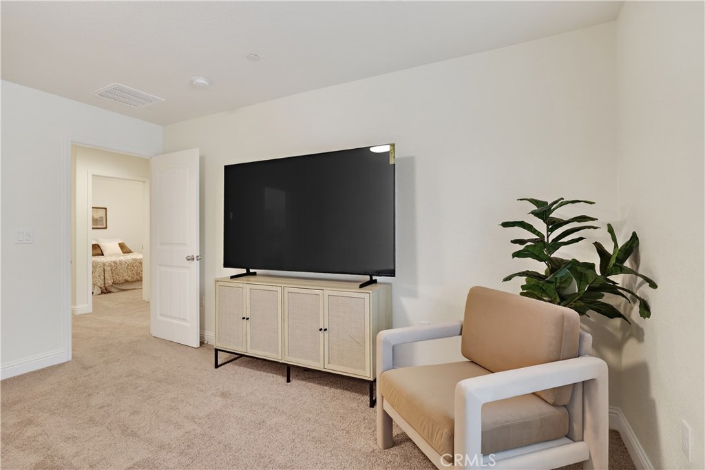 236 Montage Drive Merced, CA 95348 - Photo 20 of 36 a living room with furniture and a flat screen tv