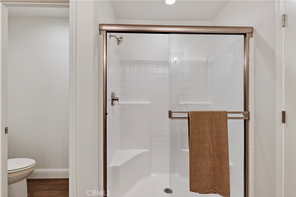 236 Montage Drive Merced, CA 95348 - Photo 22 of 36 a bathroom with a glass shower door