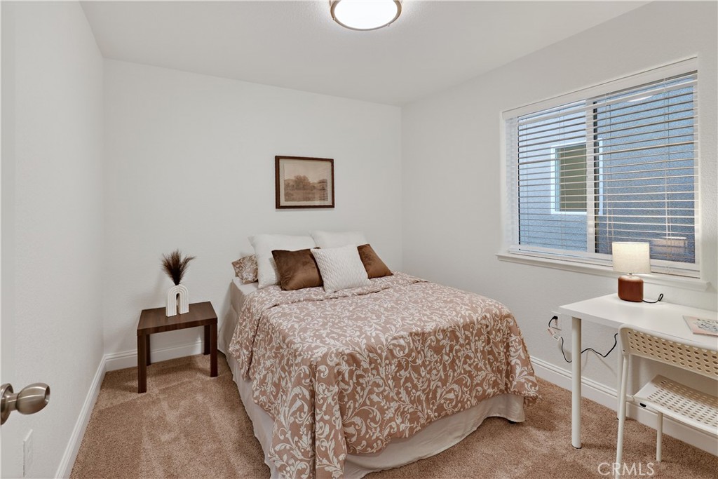 236 Montage Drive Merced, CA 95348 - Photo 26 of 36 a bedroom with a bed and a window