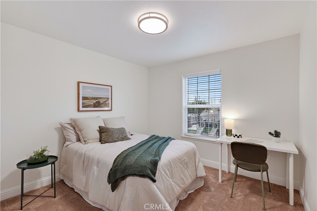 236 Montage Drive Merced, CA 95348 - Photo 30 of 36 a bedroom with a bed and a chair