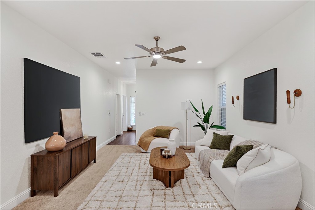 236 Montage Drive Merced, CA 95348 - Photo 7 of 36 a living room with furniture and a flat screen tv