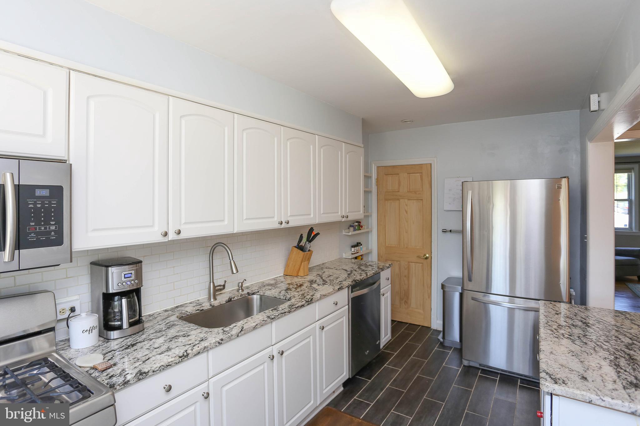 349 Whitfield Road Catonsville, MD 21228 - Photo 10 of 41 Note the built in spice rack beside door