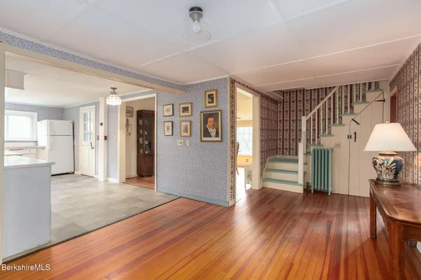 a view of a livingroom with wooden floor