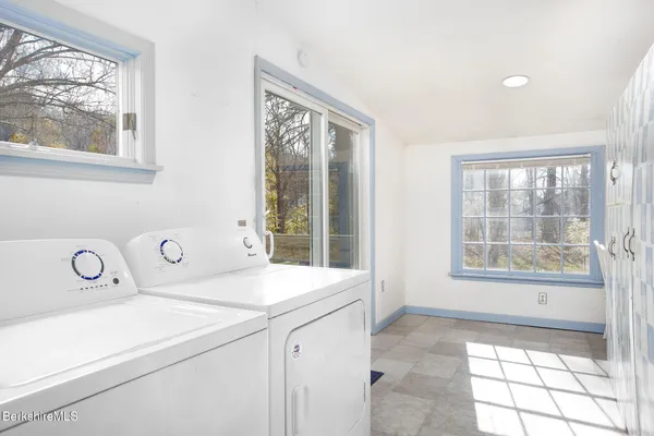 a view of a bathroom with a sink and a window