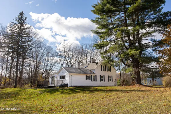 a view of a house with a big yard