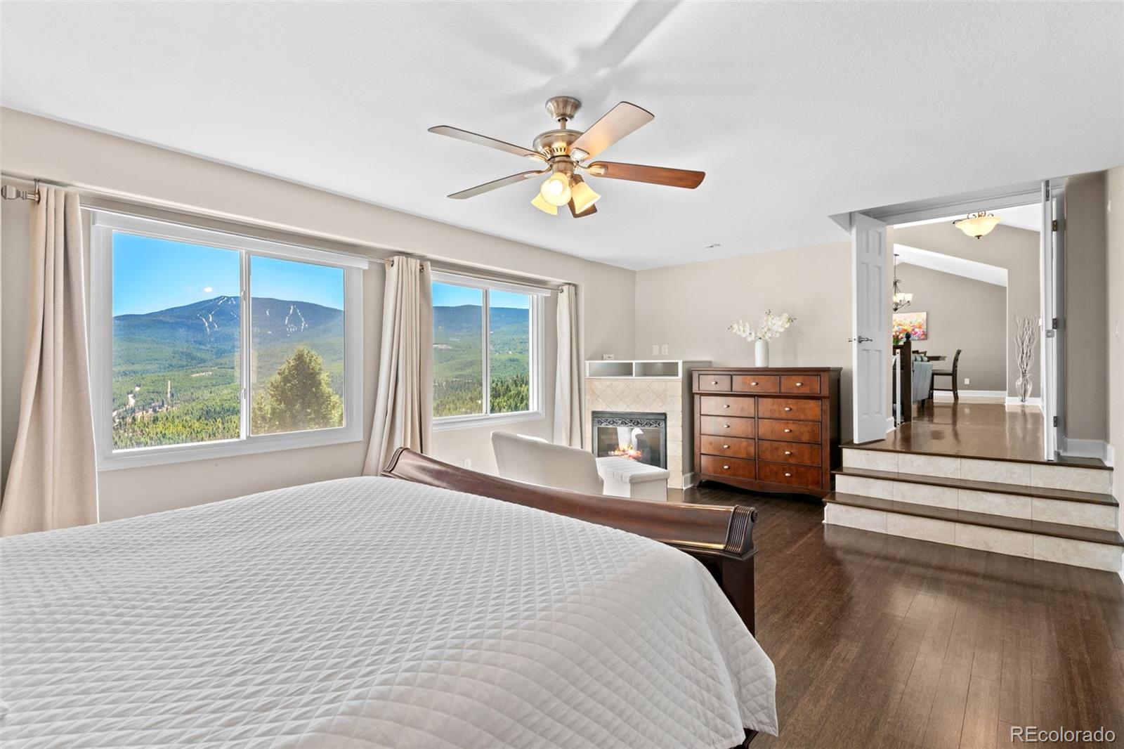 33633 Elk Run Evergreen, CO 80439 - Photo 20 of 39 a living room with furniture and a large window
