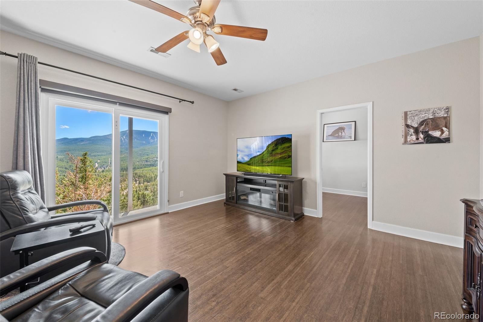 33633 Elk Run Evergreen, CO 80439 - Photo 28 of 39 a room with furniture and a window
