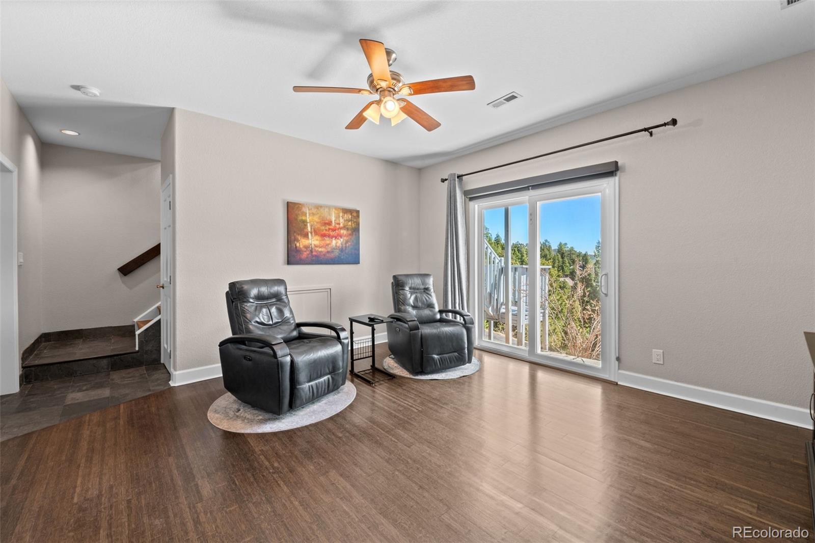 33633 Elk Run Evergreen, CO 80439 - Photo 29 of 39 a work room with wooden floor and windows