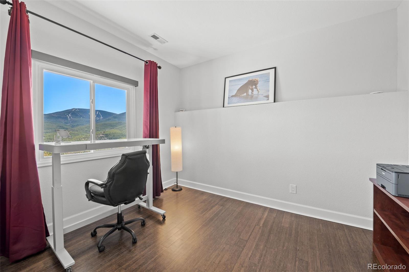 33633 Elk Run Evergreen, CO 80439 - Photo 30 of 39 a view of a workspace with furniture and a window