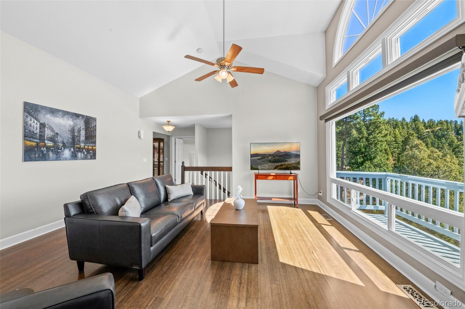 33633 Elk Run Evergreen, CO 80439 - Photo 7 of 39 a living room with furniture and a large window