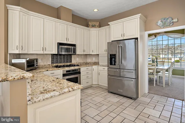 a view of balcony with wooden floor and city view