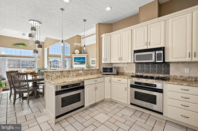 a view of a balcony with wooden floor and city view