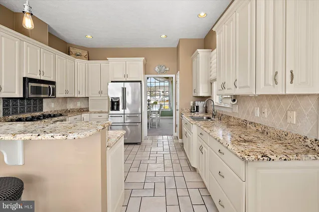 a view of a terrace with wooden floor and seating space