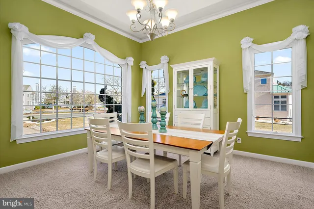 an aerial view of a house with a ocean view