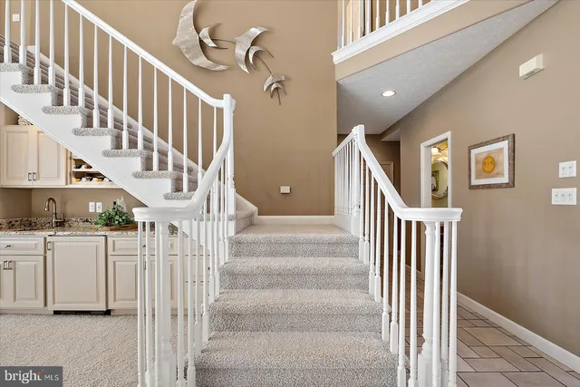 an aerial view of a house with a ocean view