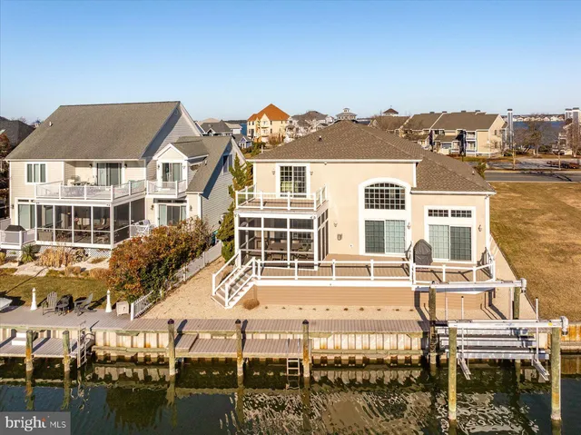 a living room with furniture and windows