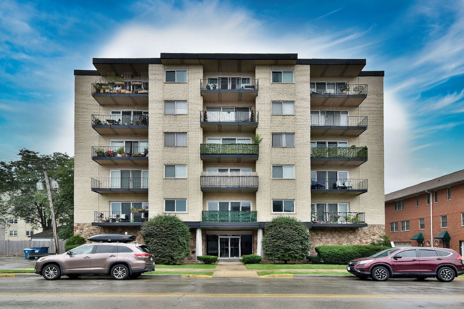 7314 Randolph Street, Unit 3G Forest Park, IL 60130 - Photo 1 of 15 a car parked in front of a building