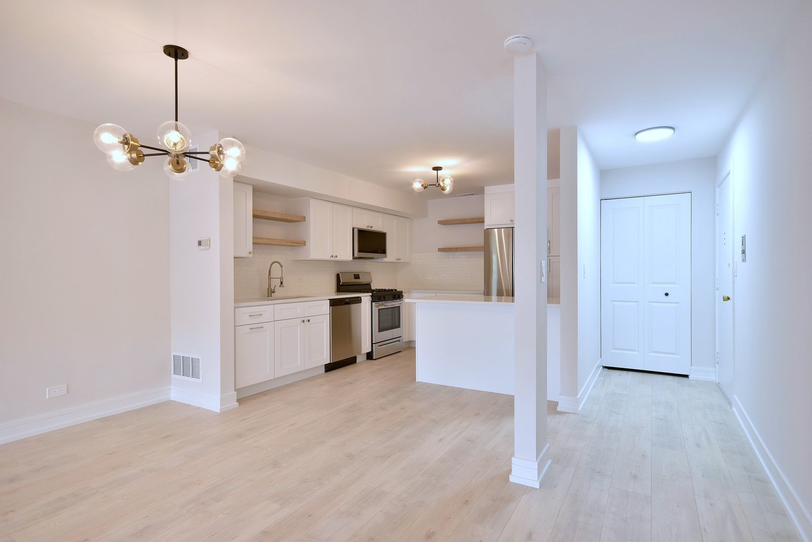 7314 Randolph Street, Unit 3G Forest Park, IL 60130 - Photo 14 of 15 a view of a kitchen with refrigerator and cabinets