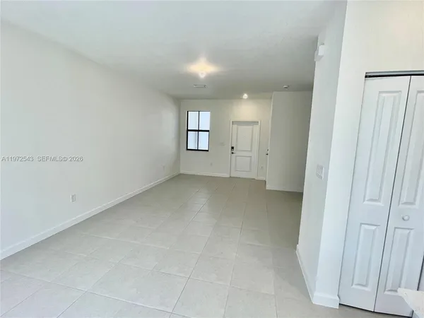 an empty room with windows