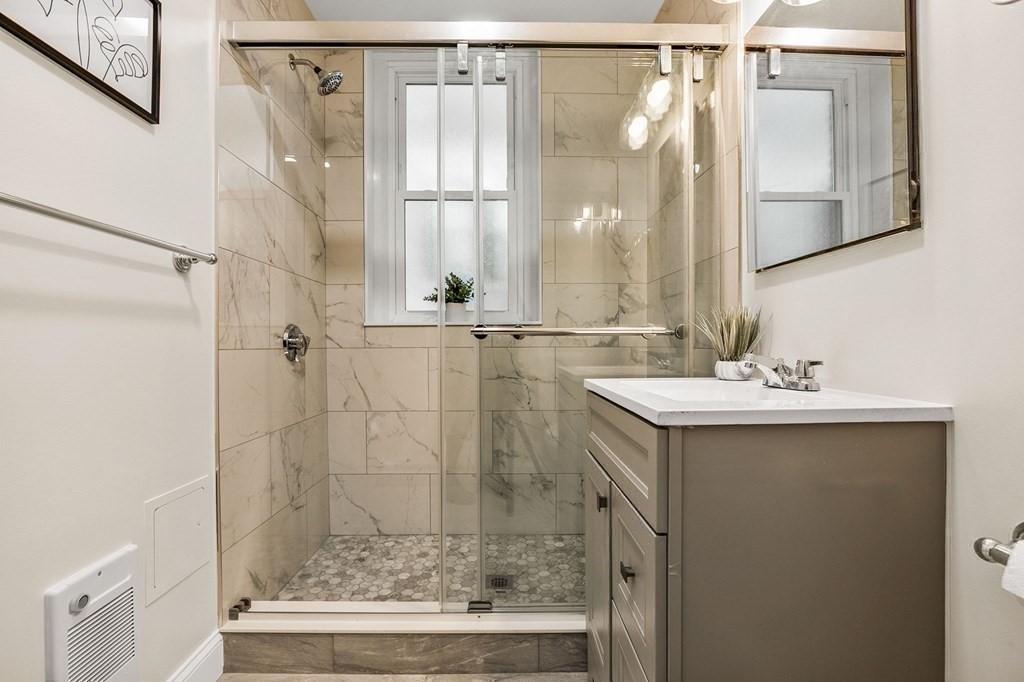 481 Beacon Street, Unit 43 Boston, MA 02115 - Photo 8 of 10 a bathroom with a shower and a sink