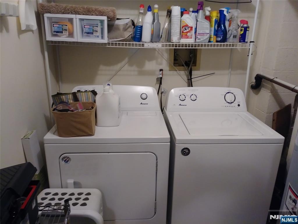 143 Raintree Lane Mahwah, NJ 07430 - Photo 14 of 19 a utility room with dryer and washer