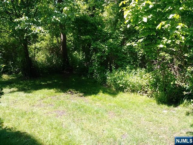 143 Raintree Lane Mahwah, NJ 07430 - Photo 16 of 19 a view of swimming pool from a yard