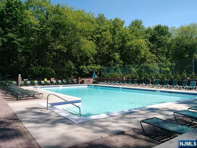 143 Raintree Lane Mahwah, NJ 07430 - Photo 18 of 19 a view of a lake with a yard