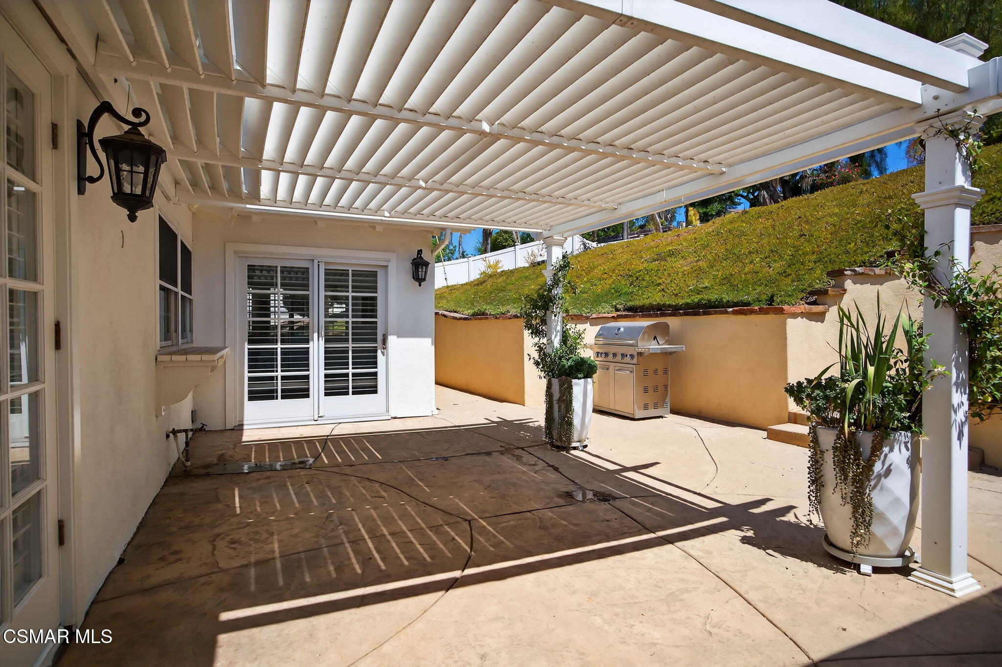 566 Rancho Road Thousand Oaks, CA 91362 - Photo 29 of 40 a backyard of a house with seating space