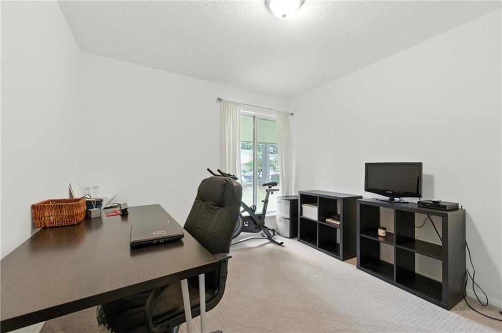 3301 Henderson Mill Road, Unit AA3 Atlanta, GA 30341 - Photo 18 of 32 a view of a workspace with furniture