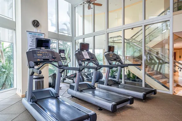 a very nice looking room with lots of gym equipment