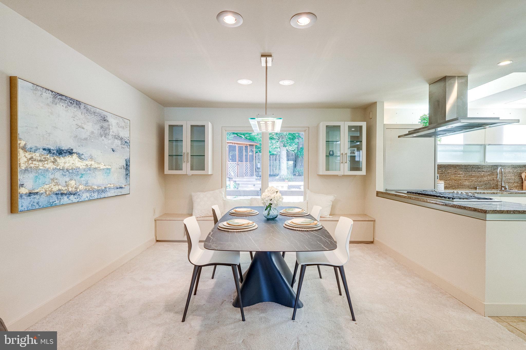 9300 Mac Swain Place Springfield, VA 22153 - Photo 13 of 47 Dining Room with built in cabinets and bench