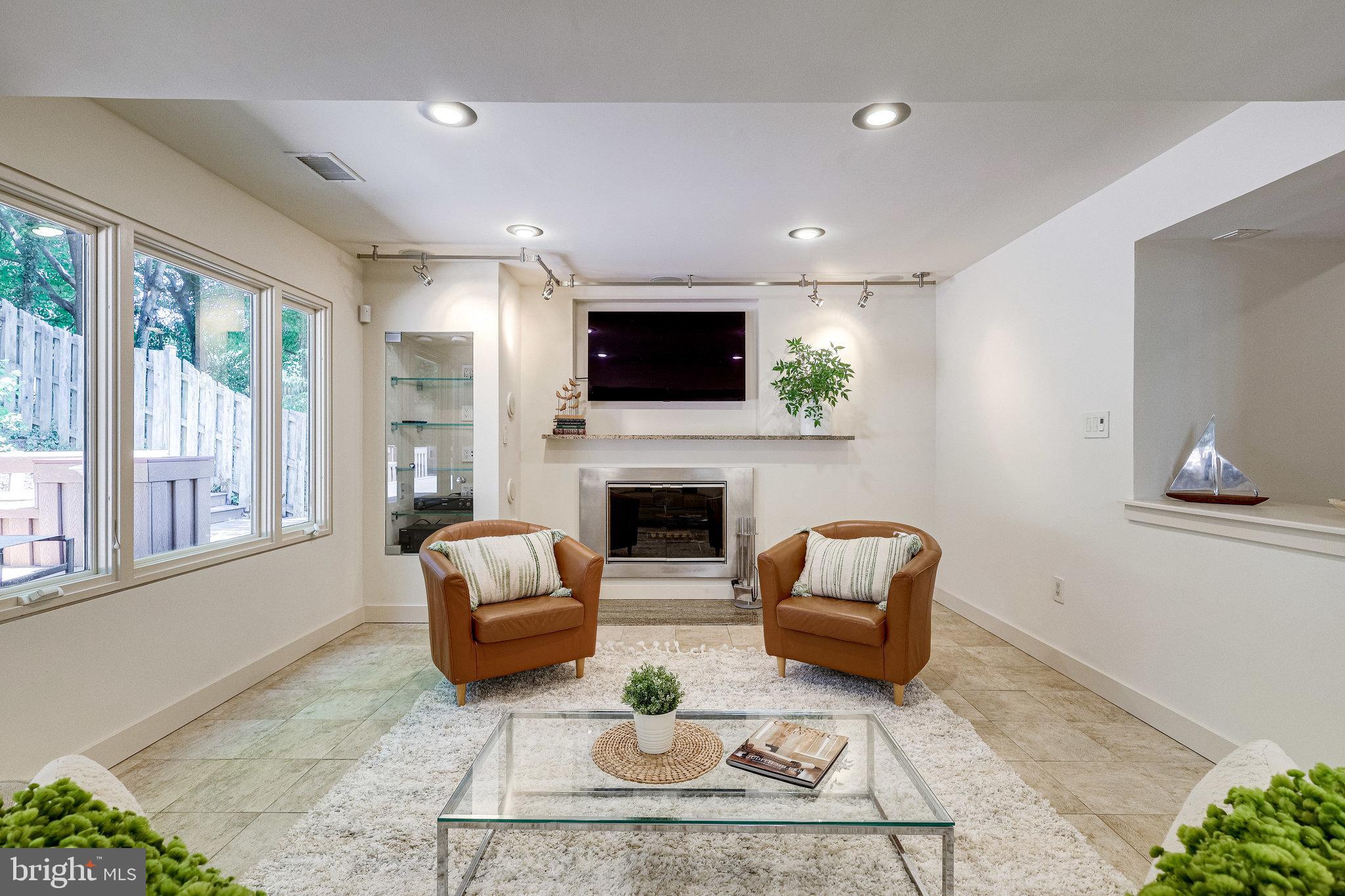 9300 Mac Swain Place Springfield, VA 22153 - Photo 9 of 47 Family Room with rebuilt wood burning fireplace