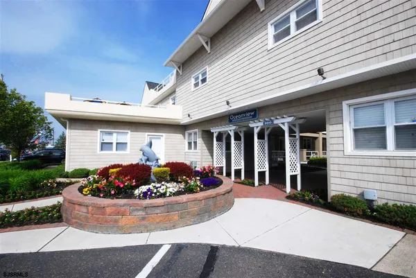 a front view of house with an outdoor seating