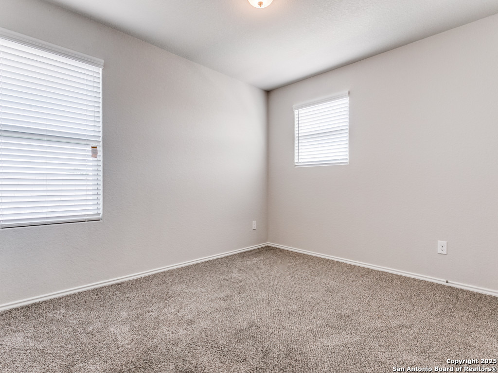 9410 Sandy Rdg Way San Antonio, TX 78239 - Photo 13 of 19 an empty room with a window