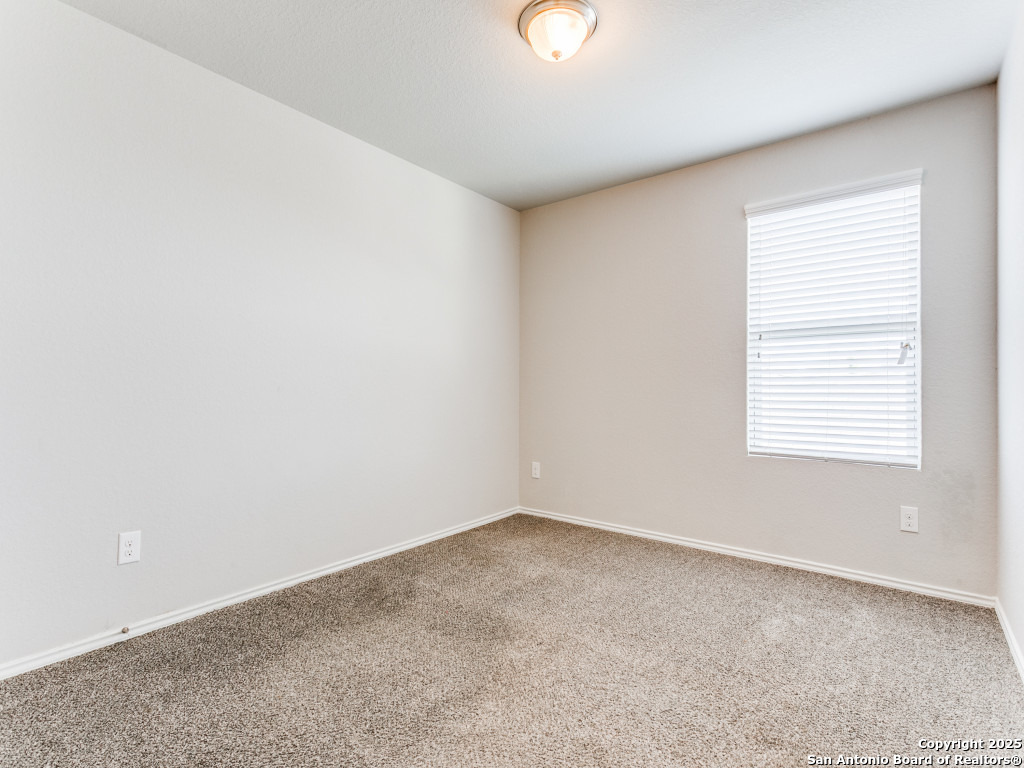 9410 Sandy Rdg Way San Antonio, TX 78239 - Photo 14 of 19 an empty room with a window