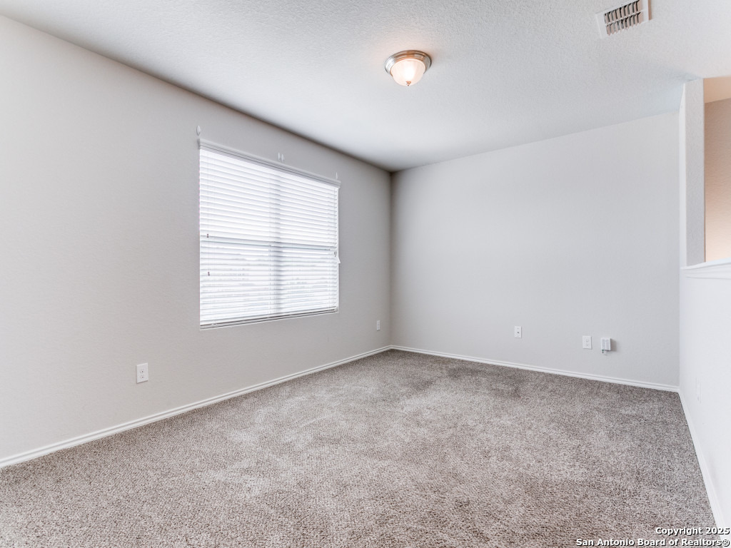 9410 Sandy Rdg Way San Antonio, TX 78239 - Photo 16 of 19 an empty room with a window