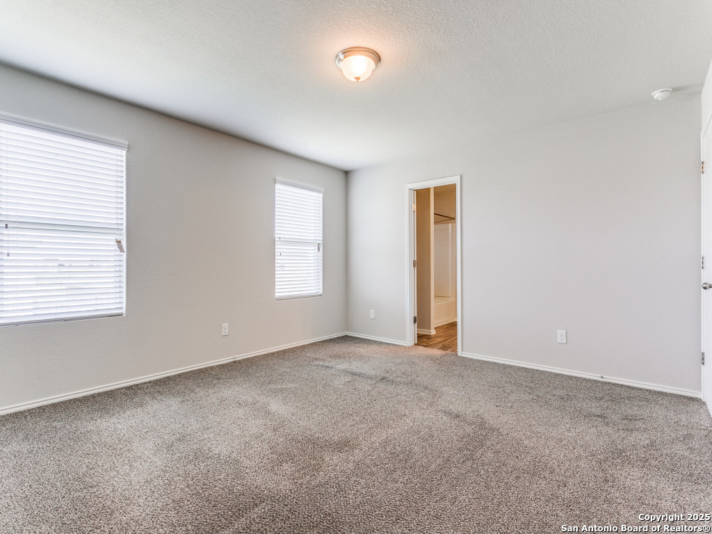 9410 Sandy Rdg Way San Antonio, TX 78239 - Photo 10 of 19 an empty room with windows