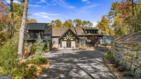 a view of a large house with a street