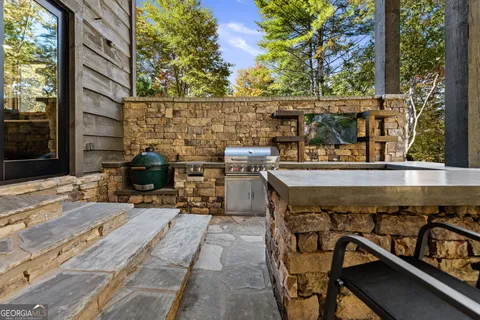 a view of a storage and utility room with washer and dryer