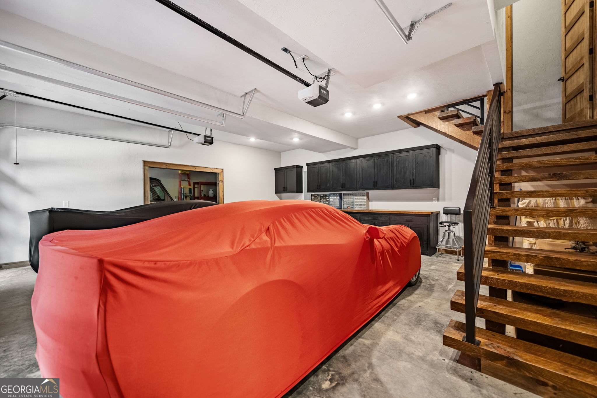 184 Spence Road Blue Ridge, GA 30513 - Photo 49 of 90 a blue bed sitting in a room next to a window