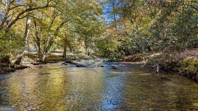 a storage room with a stove and a fireplace