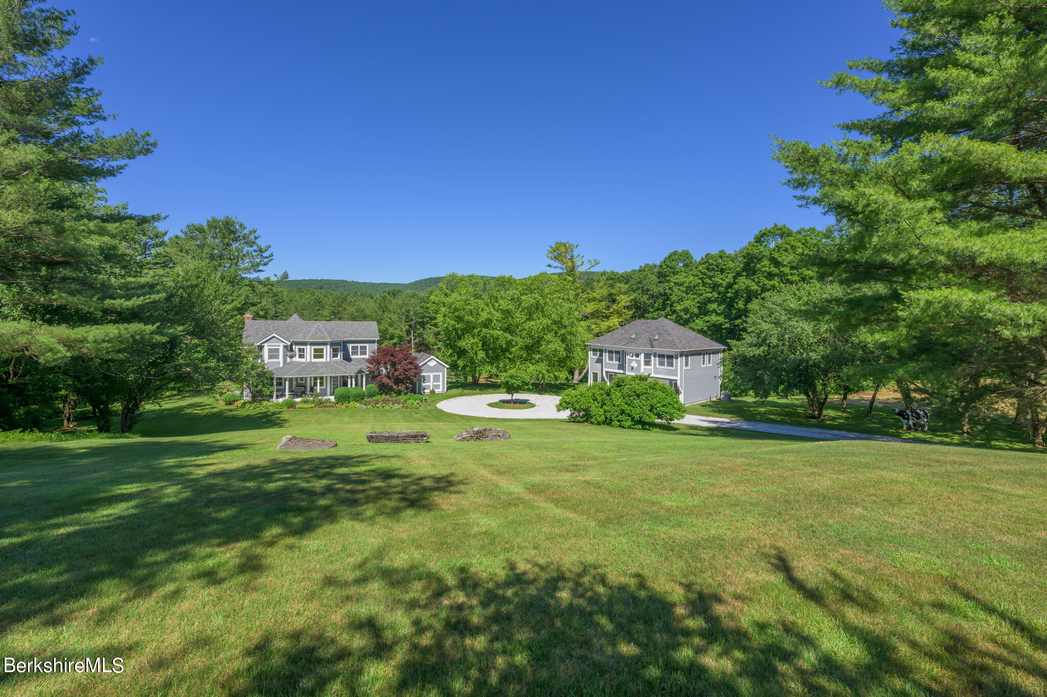 176 West Center Road West Stockbridge, MA 01266 - Photo 6 of 57 a view of a big house with a big yard and large trees