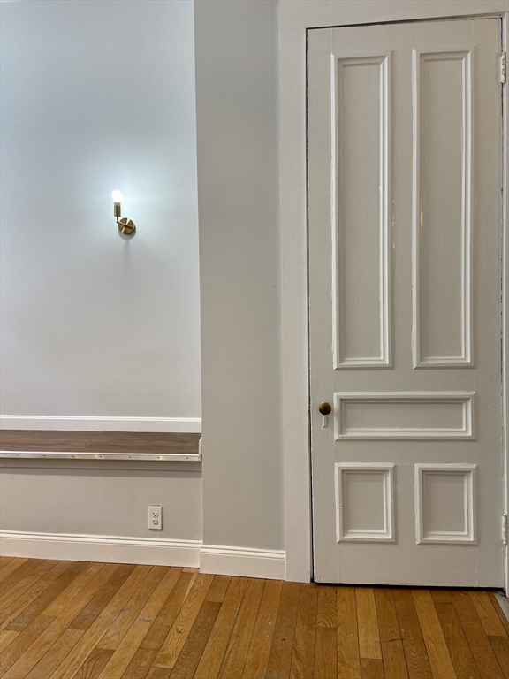 83 West Cedar Street, Unit 1 Boston, MA 02114 - Photo 8 of 15 a view of wooden floor